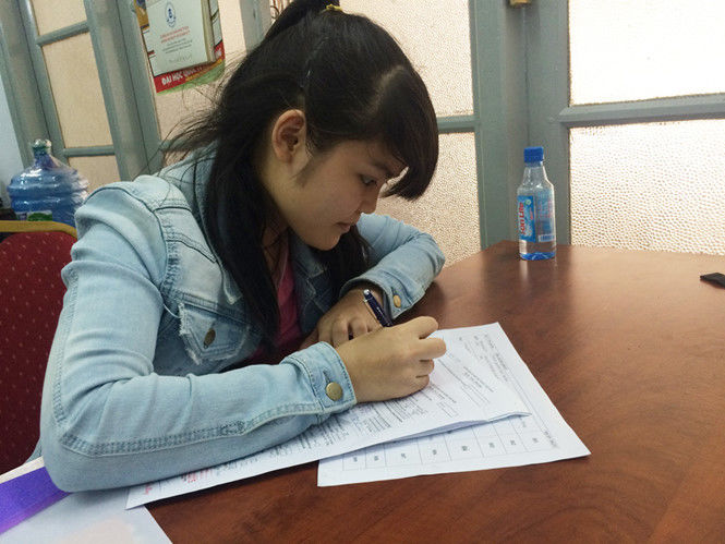 Địa chỉ trong CMND khác với hộ khẩu, khai hồ sơ dự thi thế nào?