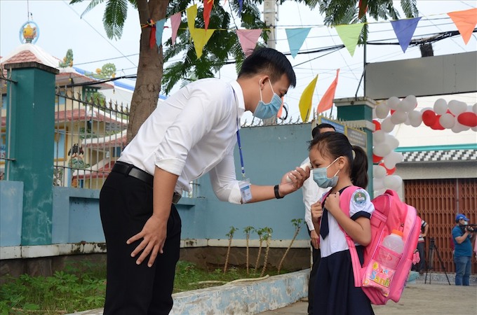 TP.HCM: Học sinh mầm non và tiểu học trở lại trường sau 9 tháng học online - Ảnh 1